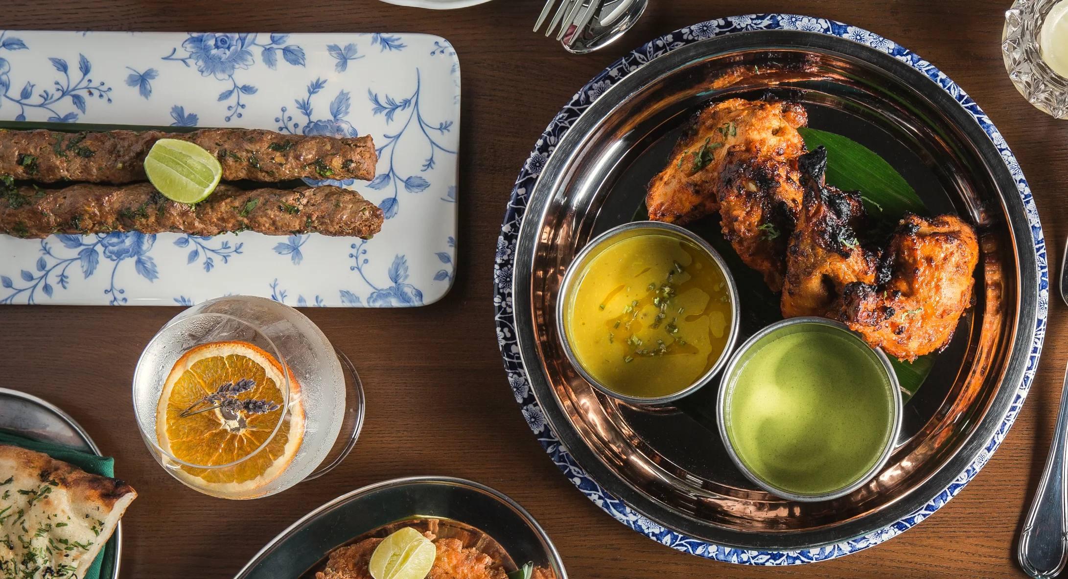 Seekh kebabs with lime and tandoori chicken with mint and mango chutney